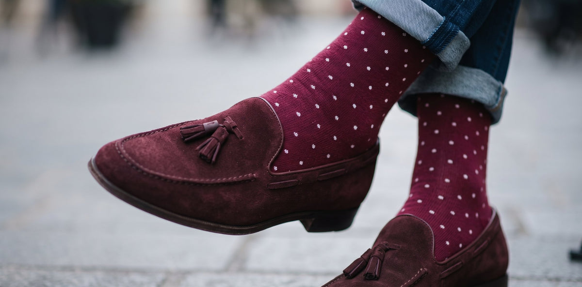 Man wearing Biz Dots Burgundy mid-calf dress socks