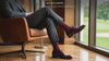 Love Sock Company organic cotton dress socks on men and women in a lounge