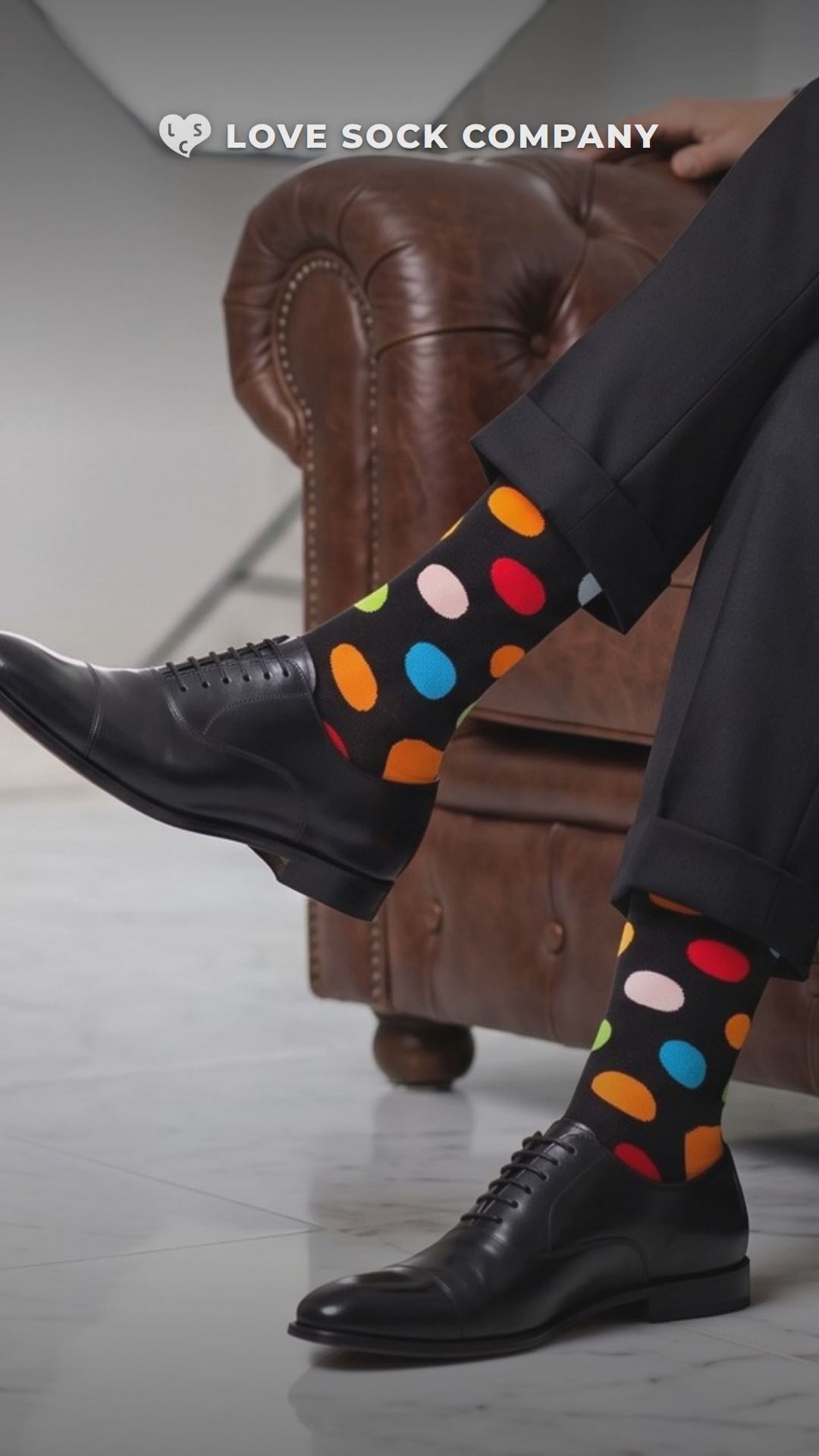 Video of Love Sock Company Big Polka Black men's mid-calf dress socks, organic cotton