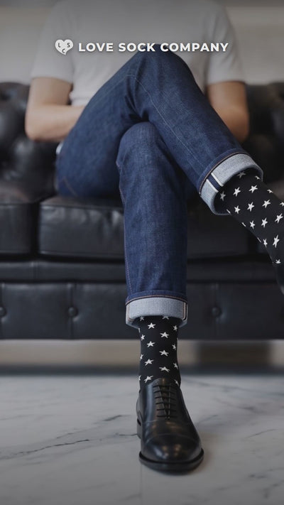 Video of Love Sock Company Stars Black men's mid-calf dress socks, organic cotton